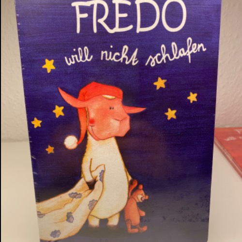 Kinder Buch Fredo schlafen, zu finden beim Stand 40 am Standort Flohkids Berlin Ost