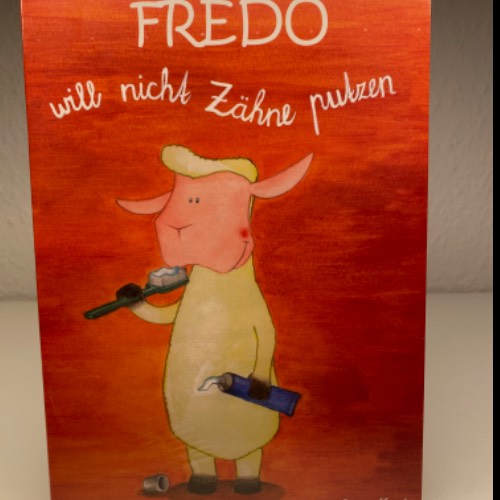 Kinder Buch Fredo Zähne, zu finden beim Stand 40 am Standort Flohkids Berlin Ost