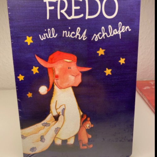 Kinder Buch Fredo schlafen, zu finden beim Stand 40 am Standort Flohkids Berlin Ost