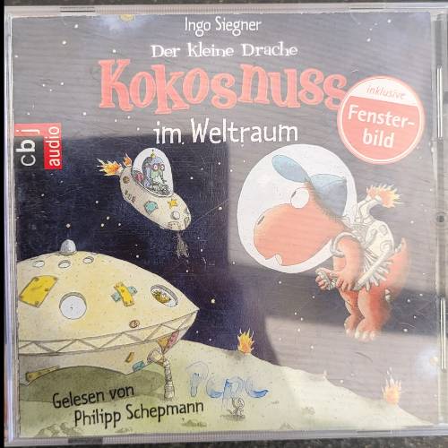 Drache Kokosnuss im Weltraum, zu finden beim Stand 8 am Standort Flohkids Berlin Ost